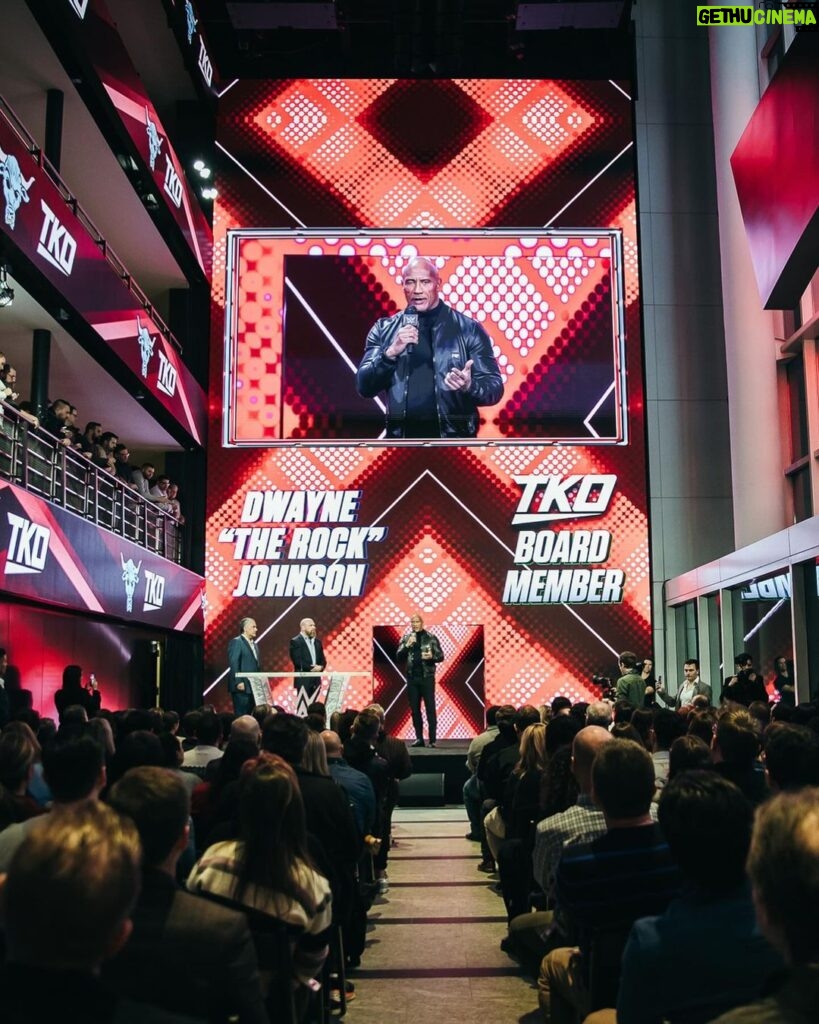 Dwayne Johnson Instagram - With our big @tkogrp announcements (Board director, Rock ownership) I needed to make one more final and most important visit - I wanted to come to Stamford, Connecticut to see our INCREDIBLE @WWE HQ TEAM in person. To express to everyone my deepest gratitude for their commitment and talents, as well as my boundless excitement to go shoulder to shoulder with everyone to continue to build our company. Face to face. Eyes to eyes. Handshakes and hugs 🫱🏼‍🫲🏾 I was completely blown away🤯🔥🔥 You can FEEL the mana, energy, love and momentum! It’s a very exciting time for our companies and I’m forever proud to have played and continue to play a very small role in the growth of WWE. I’m honored to now sit at the table that my grandfather and my father helped to build. On the shoulders of giants, we stand. In the spirit of unity we grow. ~ Rock #PeoplesChampion #WWEHQ