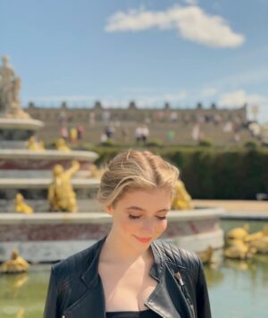 Eleanor Worthington-Cox Instagram - apparently I was more interested in a ladybird than an actual golden fountain... which isn’t even in focus #Versailles 🙄🇫🇷