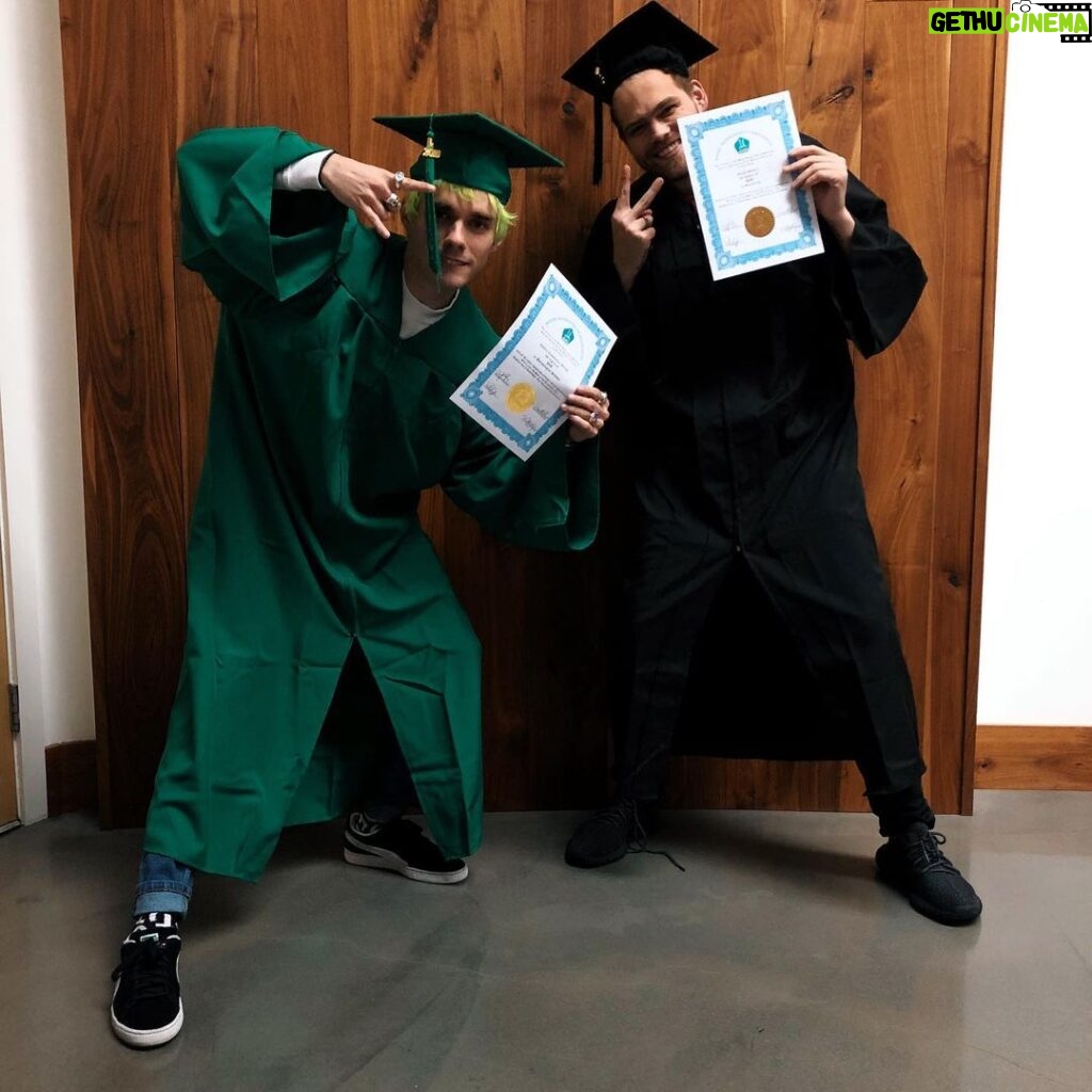 Elijah Daniel Instagram - WE DID IT. WE GOT OUR PhD’s. THEY SAID WE WERE TOO DUMB BUT GUESS WHAT BISH WE GRADUATES!!!!! 🖤🖤🖤 @awstenknight Los Angeles, California