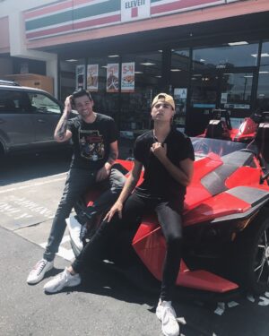 Elijah Daniel Instagram - fagman and robin. bradlee and i rented a fucking batmobile for no reason idk anymore