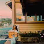 Ella Hooper Instagram – Just a girl, waiting on a train, (and that’s not just some country song bs to me, as you know I travel by train, all, the, time..) waiting for you to book tickets to my show w. @ramblinvanwalker at @thebridgehotelcastlemaine on Saturday! 💋💋💋 picturesque pic by my old pal @w_i_l_k #violetskies #violettown #trainstation #ohmygoddess #onelastshow