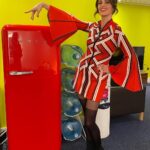 Ellie Taylor Instagram - Never not pointing at fridges that match my outfit. Hair & make up @justwade Dress @karen_millen Water cooler @bbctheoneshow Broadcasting House