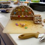 Ellie Taylor Instagram - G’day! Thanks for all your lovely messages about #GBBO last night. So glad you enjoyed the show. I love Sydders so much and it was an honour to build this iconic structure out of over-baked gingerbread held together by spit and panic. Swipe to see my first attempt, and then swipe again to see my original idea which was the Opera House out of brandy snaps. Yeh. That’s why I changed to the bridge… I had such a fun day practicing my bakes with my mum in my kitchen where we mostly laughed at the disasters we’d created. We got that special day because mum was fortunate enough to survive the cancer diagnosis she received 20 years ago. But not everyone’s mums do. Or dads, siblings or god forbid, children. So please donate, even just a couple of quid. 1 in 2 of us, baby. 1 in 2. Please donate at channel4.com/su2c (And for those asking - my shirt is from H&M about 5 years ago, and as for my 💄 and 💅- no idea - profesh bakers like me have no time for such dets)