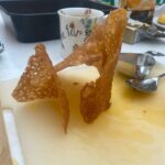 Ellie Taylor Instagram - G’day! Thanks for all your lovely messages about #GBBO last night. So glad you enjoyed the show. I love Sydders so much and it was an honour to build this iconic structure out of over-baked gingerbread held together by spit and panic. Swipe to see my first attempt, and then swipe again to see my original idea which was the Opera House out of brandy snaps. Yeh. That’s why I changed to the bridge… I had such a fun day practicing my bakes with my mum in my kitchen where we mostly laughed at the disasters we’d created. We got that special day because mum was fortunate enough to survive the cancer diagnosis she received 20 years ago. But not everyone’s mums do. Or dads, siblings or god forbid, children. So please donate, even just a couple of quid. 1 in 2 of us, baby. 1 in 2. Please donate at channel4.com/su2c (And for those asking - my shirt is from H&M about 5 years ago, and as for my 💄 and 💅- no idea - profesh bakers like me have no time for such dets)