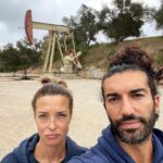 Emily Baldoni Instagram – On this #earthday we decided to take a morning hike. We thought these photos sum up the heartbreak of what we are doing to our planet. 

Just behind a gorgeous lookout lies a hideous oil well. Forcefully penetrating the earth and taking from it over and over again. If you look closely behind us you’ll also notice that the trees have black bark on them. Slowly recovering from the devastating #thomasfire a few years ago. 

This year in Southern California we are seeing unprecedented low levels of rain which is terrifying for coming fire season which the local fire department told us yesterday now lasts pretty much all year. 

And unfortunately, these are just a few examples of how we are knowingly continuing to destroy our beautiful home. 

If we want to have anything left of our planet to give to our children and grandchildren, we must work together and listen to the 97% of scientists who remind us that climate change is real. It’s not a hoax or some government conspiracy. It’s caused by us, but the good news is that it can also be fixed by us. Much of the damage can’t be undone, but we DO hold the power to reverse a lot of it. First we must come together and acknowledge the role we ALL play in it.

#earthday #onlyoneplanet #onepeople
