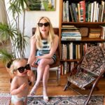 Emma Roberts Instagram - the perfect California weekend ☀️ swipe for my godson and I twinning 💙 stripes by @louisvuitton 👗 #smith by @britelkin