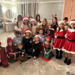 Emmy Buckner Instagram - Once upon a December, I hosted my first ‘Holiday Concert and Celebration’ filled with nearly 20 performances, crafts, games, a cookie decorating station, a hot chocolate bar, a photo booth, and of course, a bar for the adults 🥂 It was truly one of the best nights of 2023 and encompassed what the holiday season is all about. These kiddos came to me, weeks after delivering baby Cayden, and had their lessons in his nursery. Cayden was often involved as an audience member- lol. These photos and videos are just a SMALL glimpse of the night. I will NEVER forget when Baby Cayden came out as Baby Santa and surprised us all and the support and love from the audience! 🥹🎄 What I get to do for “work” is magical. I want to thank my community of students and their families for making this “idea” a reality❤️ I want to thank Mr. Max for assisting with set, sound, food, the kids, everything- love you @maxchucker !! @violetcactusvenue thank you for letting us rent the space and host the event here- it was perfect! And thank you Tina for all the help and whipping out those merry margaritas!! 🍹 And thank you Aunt Shelby @shelbywulfert for getting Baby Santa there safely and always being there for us -we love you! 💋 Violet Cactus Studio
