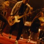 Eric Bass Instagram - CHECK THIS OUT! 😮 The official video 🎬 for “Dead Don’t Die” is out now! The song was written by @zmyersofficial (about @thebrentsmith) as a declaration of survival and an anthem about the resilience of the human spirit. The cinematic video, directed by Lewis Cater, was filmed in London at a unique and historic location and we feel it perfectly captures the triumphant energy of the song… 🖤 Check out the official video on @YouTube at the 🔗 in bio. 🎥 Director: @lewiscater 🎥 Executive Producer: @djaybrawner @maxdrose #DDDShinedown