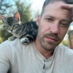 Falk Hentschel Instagram – This guy came by for a photoshoot on the ranch. I feel like he kinda mimicked my expression/vibe for each pic. He tries to hang out on my shoulder whenever i sit down anywhere. Lovely company. Minus the claws in my back as he takes his seat.😃