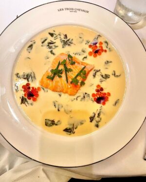Fareed Zakaria Instagram - If I were a Michelin Guide inspector, I would give two stars to the dazzling Les Trois Chevaux. Angie Mar's cooking is stunning. Look at this salmon lightly cooked with a sorrel beurre blanc. And the chic room is a visual treat.
