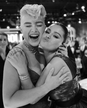 Florence Pugh Instagram - The night was full of gorgeous smiles, delicious friends and unbelievable talent. Ended up presenting the Best Animated Feature Film award with Natalie Portman and the fantastic  #theboyandtheheron ended up winning! Such a wonderful moment. Congratulations to all those nominated and all those who went home with an award. Such an achievement either way. 
Thank you for accompanying me to my first globes baby @zoelisterjones, was a treat to have you on my arm. 

Huge thanks to my ever so talented glam- 
@babskymakeup 
@hairbyadir 
@colorbymattrez 
@nailglam 
@rebeccacorbinmurray 

@maisonvalentino & @tiffanyandco 💋