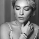 Florence Pugh Instagram - I’ve been locked to this boy for 15 years of friendship, it only feels appropriate to connect ourselves with something as special as this @tiffanyandco bracelet. In honour of what this was designed for, we’re locked with the best kind of love. #tiffanyandco #lockwithlove #tiffanypartner Thank you @babskymakeup for not only taking the time to do my face but also taking the beautiful pictures. Theo and I I’m sure will be framing and hanging above the mantelpiece. Duh.