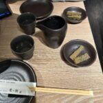 Florence Pugh Instagram - Things we learnt on our day in Tokyo.. Toby wore black jeans and regretted it. Hot. I’m finding it hard to say no to the clothes. The trees are magical and look like they can talk. It wouldn’t surprise me if you told me they can. The food is literally bursting at the seams with flavour. All I need for breakfast, lunch and dinner is dumplings. The fruit here doesn’t taste like fruit, it’s fruit squared. If I could hand deliver a single grape (oh my god the grapes here 😱) to everyone I would but I can’t and they’ll probably squish in the travel. I need another suitcase because I can’t leave things behind at the stalls. I packed wrong. High waisted jean shorts- nope. Next time= more floaty floaty things. The people here are the kindest and the purest. I want to cuddle everyone but I won’t because even though they’re kind I’m also a stranger. If there’s a gap in the buildings, you know they’ll build a cute adorable Polly pocket building that fits perfectly. I want to bathe in noodles. We cooked some hearts and some cocks and called it a night. Jet lag. Is. A. Bitch. Nothing a grape can’t fix.