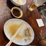 Florence Pugh Instagram - Things we learnt on our day in Tokyo.. Toby wore black jeans and regretted it. Hot. I’m finding it hard to say no to the clothes. The trees are magical and look like they can talk. It wouldn’t surprise me if you told me they can. The food is literally bursting at the seams with flavour. All I need for breakfast, lunch and dinner is dumplings. The fruit here doesn’t taste like fruit, it’s fruit squared. If I could hand deliver a single grape (oh my god the grapes here 😱) to everyone I would but I can’t and they’ll probably squish in the travel. I need another suitcase because I can’t leave things behind at the stalls. I packed wrong. High waisted jean shorts- nope. Next time= more floaty floaty things. The people here are the kindest and the purest. I want to cuddle everyone but I won’t because even though they’re kind I’m also a stranger. If there’s a gap in the buildings, you know they’ll build a cute adorable Polly pocket building that fits perfectly. I want to bathe in noodles. We cooked some hearts and some cocks and called it a night. Jet lag. Is. A. Bitch. Nothing a grape can’t fix.