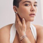 Florence Pugh Instagram - Thrilled to announce my partnership with @tiffanyandco whilst wearing the Tiffany Lock, which beautifully symbolises connection. Equally special day in shooting this campaign as I was still hiding my shaved hair at the time. Thank you for allowing me to be me, I’m very proud of what we all made that day. #TiffanyLock #TiffanyAndCo Photographer- @zoeghertner Stylist- Camilla Nickerson Hair- @peterluxhair Makeup- @babskymakeup Nails- @nailglam