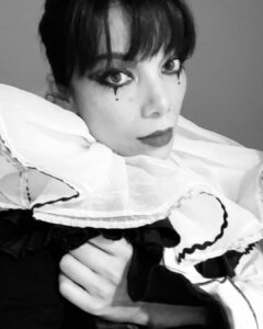 Ginger Gonzaga Instagram - Clown IRL and for Halloween. Every pic is me just trying to show that my shoes also have Pom Pom puffs on them, and my hat is still dripping Elmer’s glue. Happy Halloween!🤍🖤 Nails x @p_and_p_atl #happyhalloween #halloween #clown #perriotclown #leclown #tights #crafts #blackandwhite