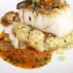 Gordon Ramsay Instagram – Stunning roasted cod with crushed potatoes, artichoke and a red wine and lemon dressing at @heddonstkitchen !! Heddon Street Kitchen