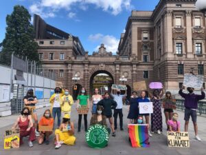 Greta Thunberg Instagram - School strike week 155, in pride colours since it’s #StockholmPride . Even though it’s summer holiday we keep on protesting on Fridays. 
#MindTheGap
#climatestrikeonline
#fridaysforfuture #FaceTheClimateEmergency
