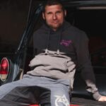 Guy Martin Instagram - Bill and the gang at @redtorpedo_ have been with Guy from the very beginning, and the gear they produce is proper quality. Guy still wears shirts they gave him back at the very start, which shows you that they stand the test of time. When they asked what design we wanted this year well it was simple Tarantino meets Nige! Looks trick as! Red Torpedo are the only producers of Guy Martin Official merch. #ad #redtorpedo #guymartinofficial