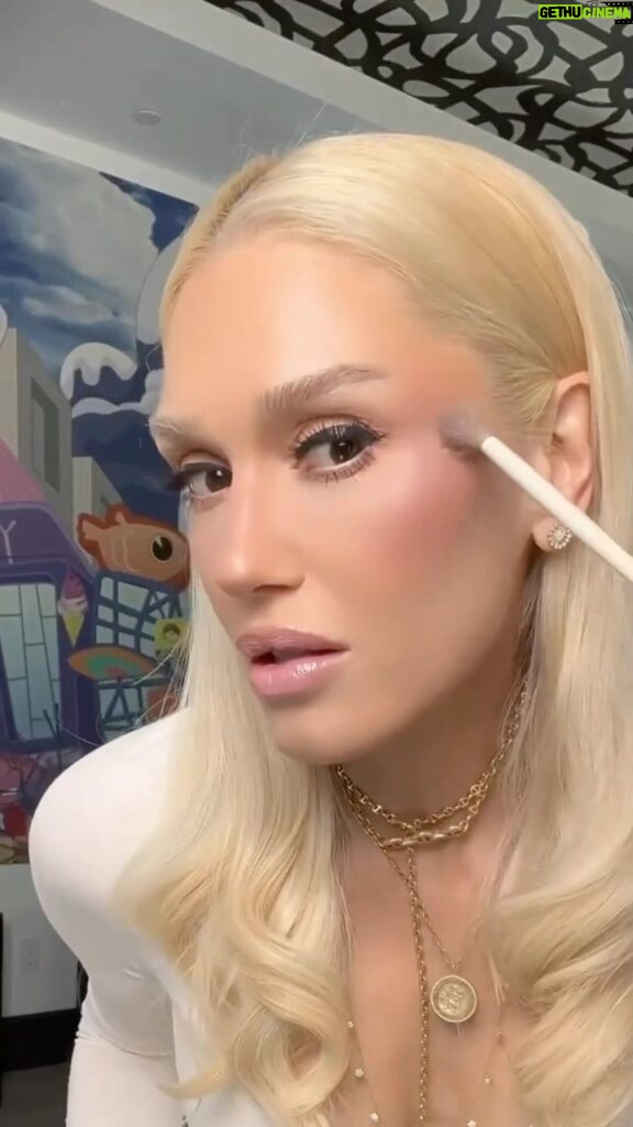 Gwen Stefani Instagram - The GLOW is GXVEing ✨ Get glowing like Gwen with our new Check My Glow Multi-Dimensional Highlighters ✨ ⚡️A gradient of shimmering, creamy powders ranging from subtle satin to show-stopping holographic ⚡️Silky smooth formula melts into skin, instantly diffusing light for a lit-from-within, radiant highlight ⚡️Formulated with a higher concentration of pearl to give more luminosity, and Magnolia Bark Extract to help even out skin tone ⚡️Available in 3 shades (Gwen wears Platinum Cowgirl) Check them out now at gxvebeauty.com, sephora.com and now available in-store @sephora + #sephoraatkohls