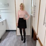 Holly Willoughby Instagram - Morning Wednesday… see you on @thismorning at 10am #hwstyle💁🏼‍♀️✨ skirt by @reserved knitwear by @needleandthreadlondon 🖤