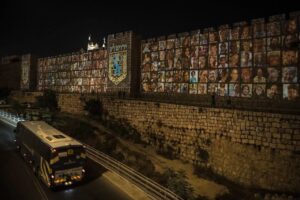 Ian Bremmer Instagram - the faces of those kidnapped by hamas
projected onto outer wall in old city of jerusalem