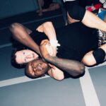 Israel Adesanya Instagram - 🛡️⚔️🛡️ “We both have South Africans to deal with.” #saylessdomore #threads #stichemup 🪡