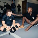 Israel Adesanya Instagram - 🛡️⚔️🛡️ “We both have South Africans to deal with.” #saylessdomore #threads #stichemup 🪡