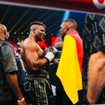 Israel Adesanya Instagram - Inspiration is a powerful force!! From the sands of the mines to making history through the sands of time ⏳✨. Honored to walk into battle with my brothers. Never above ya, never below ya, always beside ya. #momentsforlife #ThreeKings 👑👑👑