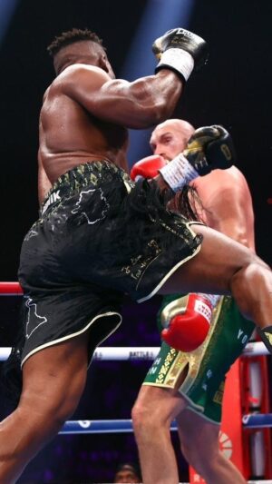 Israel Adesanya Instagram - Boxing as a sport is beautiful. Boxing as a business is corrupt as fuck! For example…March 2015, in this clip I get illegally hit and my opponent doesn’t get a point deducted. I rock him and put him on the canvas and it’s considered a slip. I throw a Superman Punch rocking him again and get warned cuz my foot was off the ground and it’s “illegal”. They must not know about David Tua’s leaping left hook 😂. Anywhore, I’ve done my time in boxing as a “rookie” to the game and it felt easy for me. I decided to pursue MMA because in my heart as a kickboxer I knew some nerd in pjs made of sandpaper could beat me without throwing a single strike. Having to learn a whole new set of skills from scratch was very humbling, but it paid off in the long run 😜. It was fun but  I’ll never box again, I prefer to use all my weapons in a real fight‼️