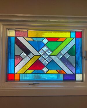 Ivy Winters Instagram - Hello everyone! I hope everyone has been staying happy and healthy this winter season!I’ve been pretty busy making stained glass panels and wanted to share with you my latest commission piece. It’s 31” by 21” with a fun range of colors, textures and square bevels. It has been recently installed in my clients laundry room (last picture). #stainedglass #leadwindow #lead #glass #glasscutter #beveledglass #art #window #handmade