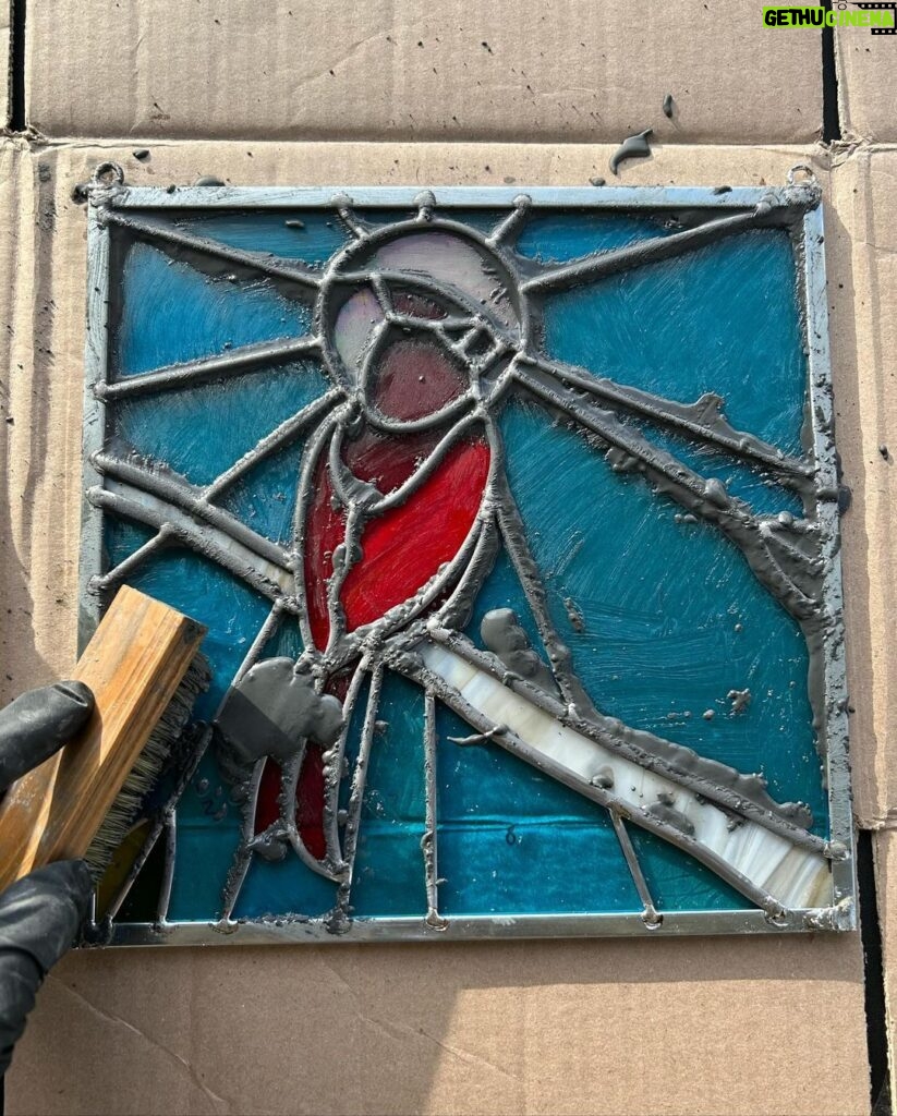 Ivy Winters Instagram - A cardinal panel I created for my cousin ❤️ I enjoyed making this piece for her. I included a little video of the cementing process. It was a breezy cold day and my wind-chimes were just a singing ❤️ #cardinal #stainedglass #leadedwindow #cement #windchimes