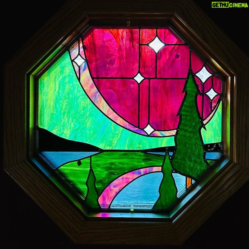 Ivy Winters Instagram - I had a fun time making this northern lights window for my folks house. Each beveled star represents a direct member of our family. So happy how it fit right into the octagon frame as this was my first octagon window! Jamin out to #gilbertosullivan #stainedglass #leadedwindow #forrest #northernlights #antiqueglass