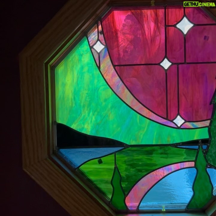 Ivy Winters Instagram - I had a fun time making this northern lights window for my folks house. Each beveled star represents a direct member of our family. So happy how it fit right into the octagon frame as this was my first octagon window! Jamin out to #gilbertosullivan #stainedglass #leadedwindow #forrest #northernlights #antiqueglass