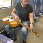 Jack Broadbent Instagram - Changin’ my strings on the train to London. @daddarioandco thanks so much for keeping me rocking. Trying some 11’s tonight instead of my usual 12’s or 13’s. What strings do you guys use out there? Peace, Jack ✌️Catch my last European tour date tonight at the @thejazzcafe Camden Town. Some tickets still available #daddario #guitarstrings #jackbroadbent London, United Kingdom