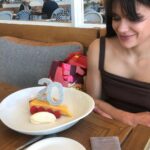 Jane Hall Instagram - A delicious lunch at @elwoodbathers for us… birthday candles for the ex teenager. Also what happens when you leave your beloved @haighschocolates freckles in the car while you’re dining. ☹️. Happy Christmas to all xxxx