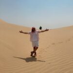 Jane Hall Instagram - We went on a desert safari at @babalshamshotel and it was incredible. And hot. And exhilarating. And hot!! We laughed all the way…. Can’t wait for you to see it on our ep of @luxury.escapes Honestly, this is an incredible experience!! My dress is @bonne.com.au Pure, cool silk. Thanks to @eugeneloane the superstar in all things photographic, and obs @thecrazybull for putting up with me shrieking on the dunes!!!!!!