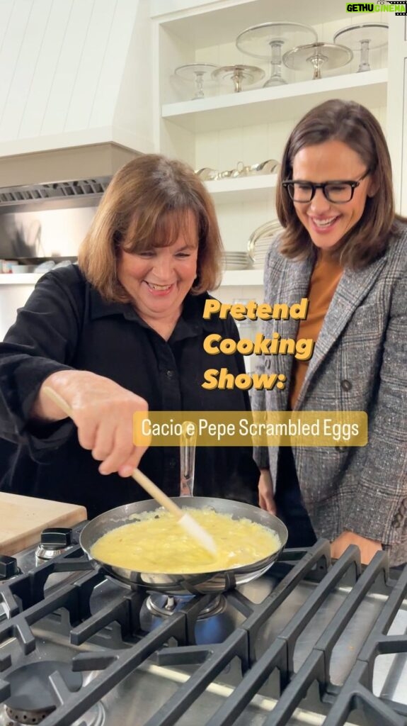 Jennifer Garner Instagram - #PretendCookingShow: Cacio e Pepe Scrambled Eggs. 🍳 Happy birthday to my Queen, my friend, and my Cooking Fairy, @inagarten. Making a Pretend Cooking Show with the Contessa who inspired it was 🤯 meta for my brain. I always love meeting up with you, Ina, especially for our very special, to-be-seen-in-2024 get together in your beautiful barn. ♥️ . Cacio e Pepe Eggs by @inagarten (from Go-To-Dinners) Ingredients: - 12 extra large eggs - 1 cup whole milk - Kosher salt and freshly ground black pepper - 4 Tbsp unsalted butter - 2/3 cup freshly grated pecorino cheese (plus extra for serving) - 4-5 slices toasted country bread . Directions: 1. Whisk the eggs, milk, and 2 teaspoons of salt together in a medium bowl. 2. Put the butter in a cold large (12 inch) sauté pan and place it over medium/low heat. Allow the butter to melt almost completely, then add the egg mixture. 3. Cook over medium/low for 8-10 minutes, stirring occasionally with a rubber spatula. When the eggs start to make small clumps, stir them more rapidly, scraping the bottom of the pan, and cook for another 4-5 minutes. 4. When the eggs are almost cooked, turn off the heat and continue to stir the eggs rapidly until they’re soft and custardy. (When you pull the spatula through the eggs, they will still be soft but they will stay in place.) 5. Stir in the Pecorino and 2 teaspoons of pepper. 6. Spoon the eggs over toasted bread and serve hot sprinkled with extra Pecorino. 7. YUM.