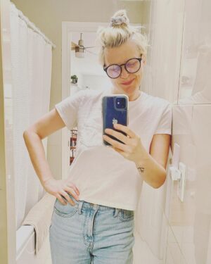 Jennifer Robertson Instagram - Woman who vehemently swore she would never wear 80’s style clothing again, catches herself in the mirror wearing mom jeans, large round glasses, and a scrunchie.