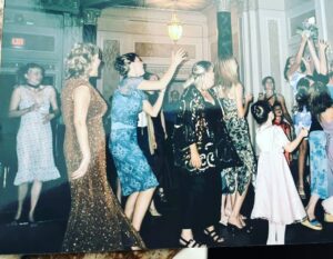 Jennifer Robertson Instagram - My uncle’s wedding many years ago. As you can see SOMEBODY in the far left corner did NOT want to catch the bouquet!  The sheer terror on my face 😂 thanks for the laugh @megs