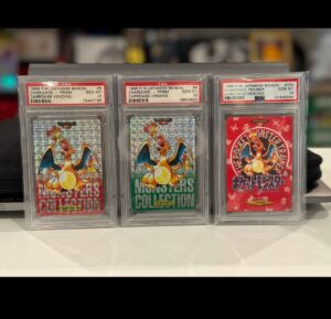 Jeremy Padawer Instagram - A complete set of 1996 Carddass Charizard PSA 10.  Maybe less than 5 complete sets in existence? 

#000 PSA 10 Charizard Trainer (pop 10)
#6 PSA 10 Charizard Prism Red (pop 50ish)
#6 PSA 10 Charizard Prism Green (pop 30ish)

The red and green are together in the pop report (87 total). 

Some believe Carddass is the first set.  I believe it very likely hit the street first. 

I’ve never received the complete story on Carddass vs Topsun.  My belief is that the Topsun license might have been first signed.  Style guide appears to be the oldest based on many conversations I’ve had.  Art and dating.  However, Carddass appears to be distributed first - first in consumer hands.  The question of printing will never be known.  If Topsun was licensed, printed and held in a warehouse - explaining the 1995 mark - will remain a mystery.  How 1995 mark was ever reviewed and approved in such a comprehensive system will remain a mystery. 

Carddass appears to have the best clear claim to 1st in consumers hands.  And, over time, that makes the 3 Carddass cards in the set Green Prism, Red Prism and 000 Trainer very rare and worthwhile in Pokémon history… and without further information, they may be the true rookie cards.

The most comprehensive review and tracking of this set is done by @maxmaxcity - a seriously committed and passionate collector.

Some opinion above!! ❤️❤️
Jeremy