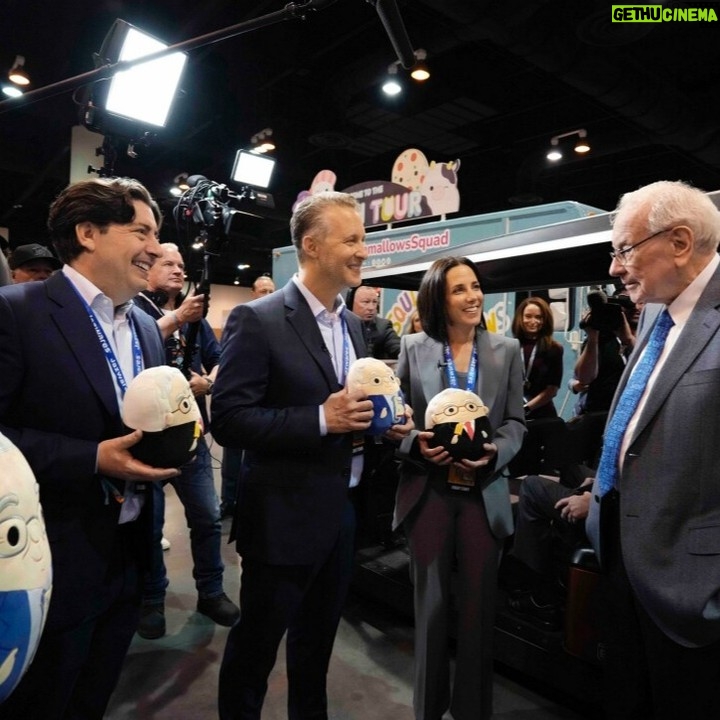 Jeremy Padawer Instagram - Watching Charlie Munger eat an entire box of See's Peanut Brittle at the 2023 annual Berkshire Hathaway meeting, while also masterfully answering questions for almost 6 hours, will remain one of the highlights of my professional career. When we asked Mrs. Buffett if she'd like a Warren Buffett and Charlie Munger limited edition Squishmallows, she responded - "I'll take Charlie." We exclaimed, "Why, just Charlie?!" She replied, "I see Warren every single day. Every day. I'll take a Charlie." ❤️ We all honestly believed that we had at least a few more annual meetings ahead to enjoy the folksy brilliance of the Buffett Munger combination... perhaps the greatest business team of all time. Photo #1 - Charlie Munger after many hours of Q&A enjoying his peanut brittle. Photo #2 - judd zebersky, Laura Zebersky, myself, and other @jazwares team members enjoying a conversation with Warren Buffett while handing over some Warren and Charlie limited edition Berkshire Hathaway 2023 annual meeting @squishmallows At 99.5 years old, Charlie Munger sat in front of a live audience of 40,000 with so much life... a life filled with purpose... a life well lived.