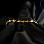 Jessica Lord Instagram - Introducing the JULIE. Our most dainty and delicate piece, this twisted chain necklace is an embodiment of life’s twists and turns, symbolizing the interconnectedness of our experiences and the intricate yet often unseen connections that bind us all. Create a seamless ensemble suitable for any occasion and pair with our NICOLE bracelet and LAUREN ring. These pieces and their unique, yet simple, textures are a testament to the timeless beauty of simplicity. Head to bizouxx.com to secure your pieces in time for the holidays! X @shopbizouxx