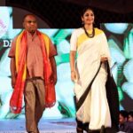 Jhansi Instagram - One of my favorite moments captured. Throwback to the ramp with the artisan who wove the artsy tale on the hand loom. Proudly wearing a Gadwal silk saree @abhihaara along with #venkatesh netha . Walk with the weaver. #supporthandloom #telanganaweaves #gadwalsarees #ikkat