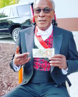 John Amos Instagram - BTS On The Set of Coming 2 America! My Manger @paulyfilms00 captured me having fun with some of Akeem’s Money! C2A Streaming Now on @amazonprimevideo ! -J.A.