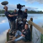 John Bell Instagram - The other side of the lens 📽✨ It takes a village to make a show like Outlander. How I miss these guys and the incredible work the whole crew does. @outlanderstarz #bts #outlander #crew