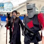 John Cleese Instagram - Brilliant! REPOST • @fleshandbloodcosplay Rode into SDCC 2023 like Monty Python royalty 👑 🥥 #fleshandbloodcosplay #montypython #montypythoncosplay #theblackknight #knightswhosayni #shrubbery #timtheenchanter #montypythonandtheholygrail #sdcc2023