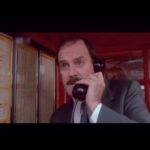 John Cleese Instagram - It’s eaten the money! from “Clockwise” ⏰ 1986 #80scomedy #80smovies #80smovie #headmasters #payphone #telephonebooth #telephonebox #phonebooth #runninglate #clockwise #redtelephonebox