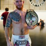 Johnny Eblen Instagram - The CHAMP is here!🏆 YOKKAO Fight Teams @johnnyeblen ready to turn up the HEAT🔥 #Yokkao #mma #fight #fighting #champion American Top Team