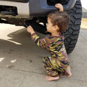 Johny Hendricks Instagram - My boy helping me work on my truck.
